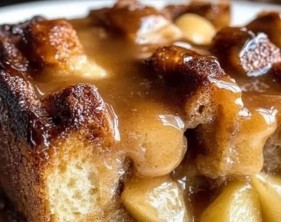 Delicious caramel apple bread pudding served in a dish.