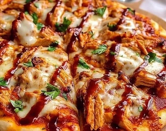 Delicious cheesy BBQ chicken pizza topped with fresh ingredients