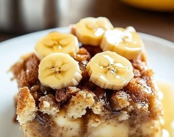 Deliciously baked banana bread pudding served in a bowl.
