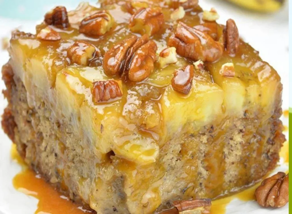 Slice of banana upside down cake topped with caramelized bananas