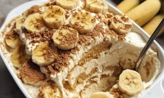 Delicious Biscoff banana pudding in a glass with cookie crumbles on top