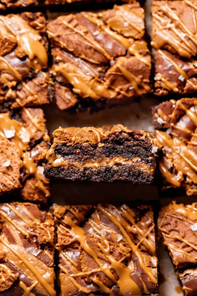 Delicious Biscoff brownies topped with cookie butter for a sweet treat.
