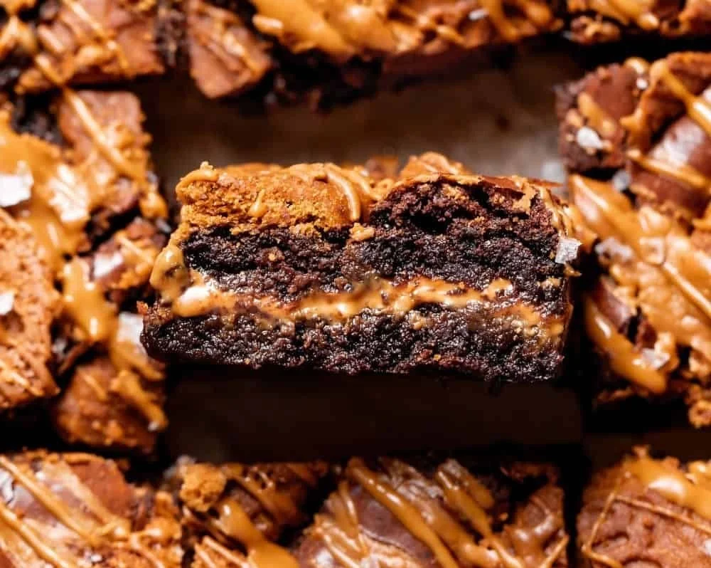 Biscoff cookie butter brownies with a rich chocolatey texture and cookie butter drip