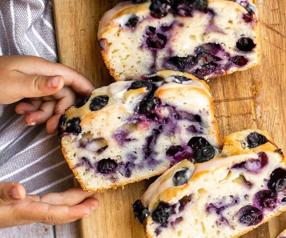 Freshly baked blueberry lemon bread with blueberries on top