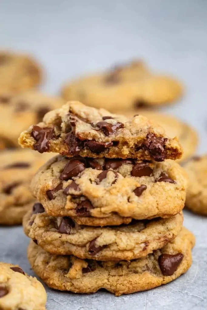 Chewy brown butter chocolate chip cookies on a baking sheet.