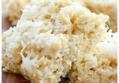 Delicious Coconut Lover's Rice Krispy Treats stacked on a plate