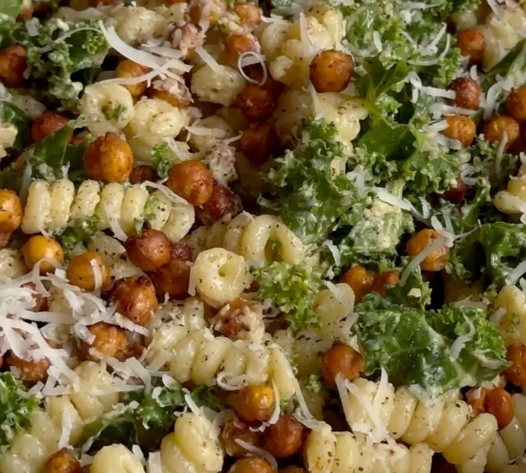 Delicious Pasta Caesar Salad with fresh ingredients and dressing