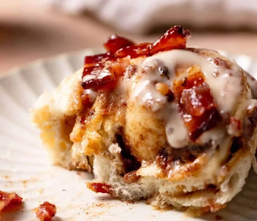 Delicious Bourbon Maple Bacon Cinnamon Rolls ready to serve.