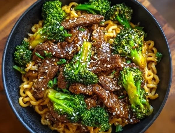 Delicious bowl of Chinese Crispy Beef with Broccoli and Noodles