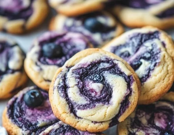 Creamy blueberry cheesecake cookie with fresh blueberries and a crumbly crust