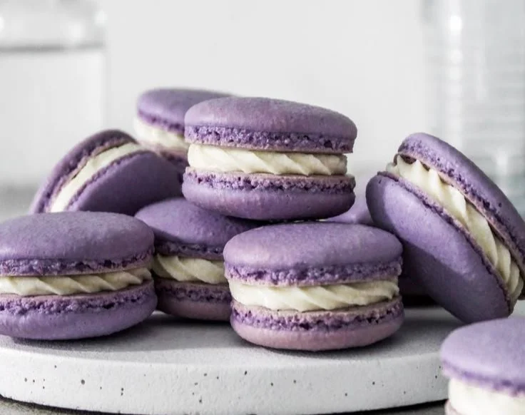 Plate of colorful homemade French macarons in assorted flavors