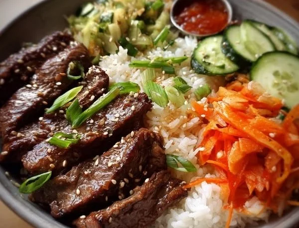Korean BBQ steak bowl with marinated beef and fresh vegetables