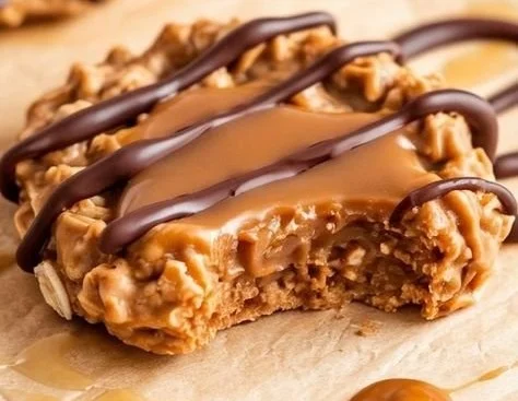 Peanut Butter Chocolate Caramel Cookies freshly baked on a cooling rack