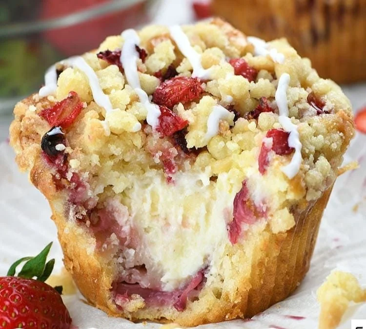 Delicious Strawberry Cream Cheese Muffins with fresh strawberries on a plate