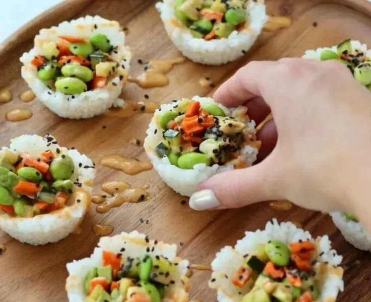 Delicious sushi cups filled with fresh ingredients and vibrant toppings.