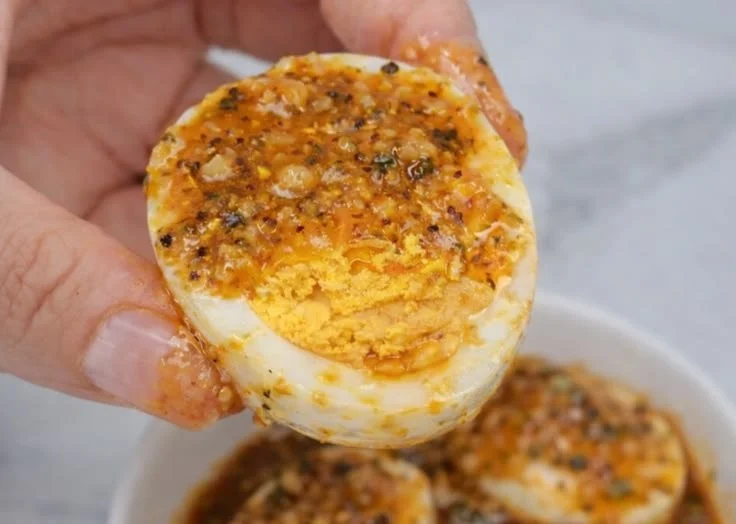 Delicious Cajun Crab served with flavorful boiled eggs