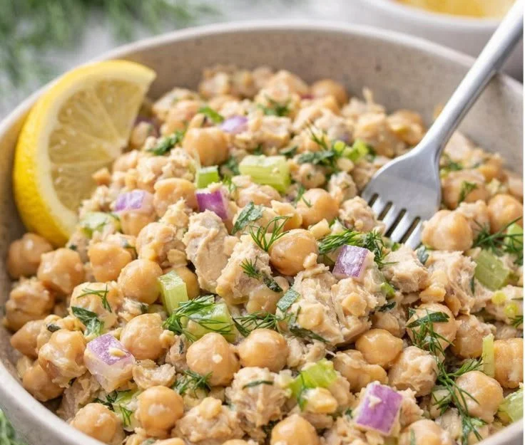 Healthy Tuna Garbanzo Bean Salad with vibrant vegetables and dressing
