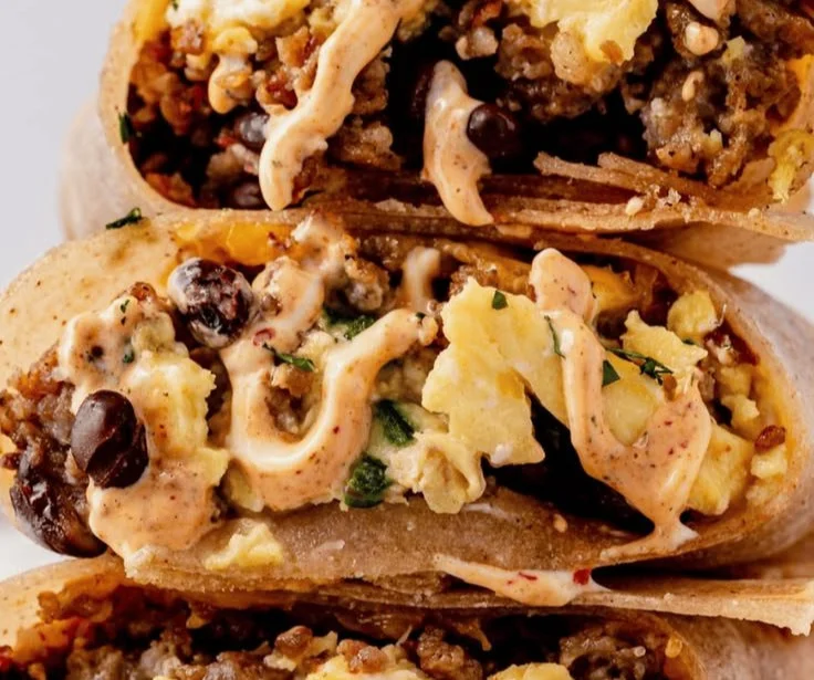 High-protein breakfast burrito filled with eggs, beans, and veggies.