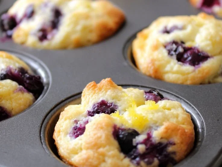 Lemon-blueberry protein bites on a plate, healthy snack rich in protein.