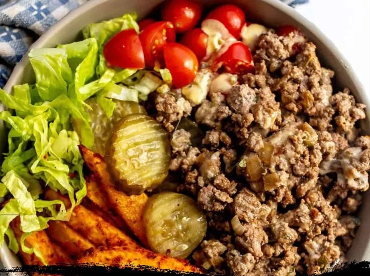 Protein-packed cheeseburger bowl with ground beef, veggies, and cheese