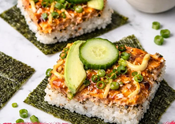 Spicy Salmon Sushi Bake dish served with chopsticks and garnishes