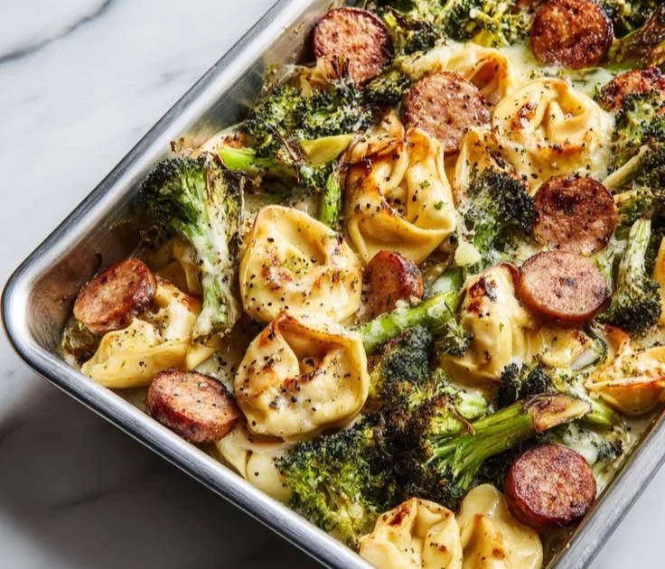 Sheet pan Broccoli Tortellini Bake with cheese and fresh broccoli