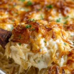 Delicious French Onion Chicken Orzo Casserole served in a baking dish.