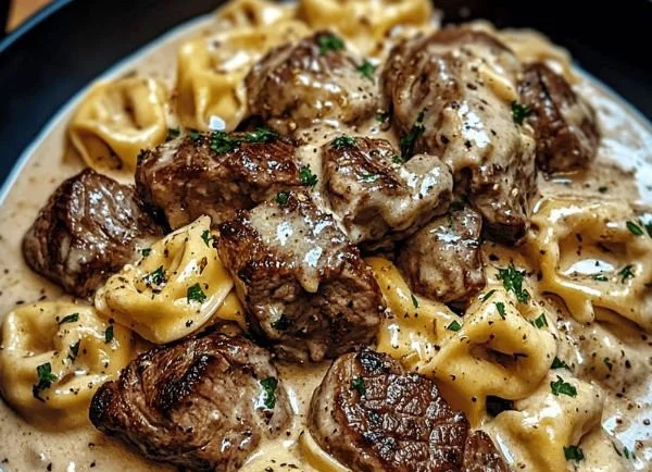 Delicious Garlic Steak Tortellini served with herbs and spices
