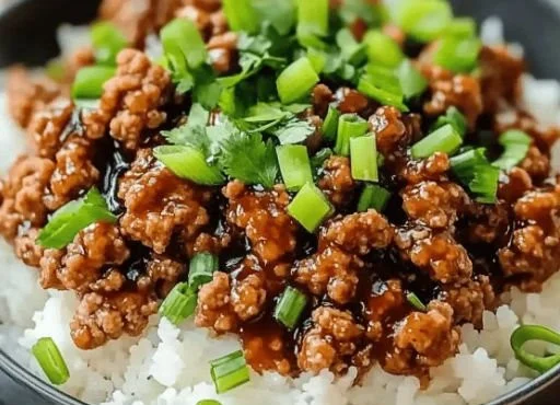 Honey garlic ground turkey dish served on a plate with vegetables.