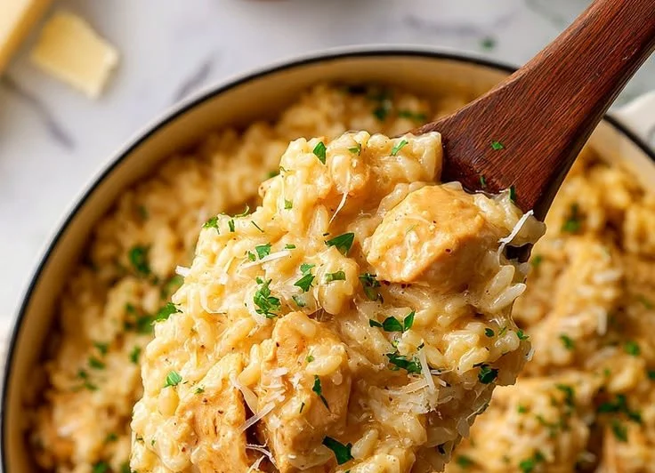One-pot garlic parmesan chicken and rice served on a plate.